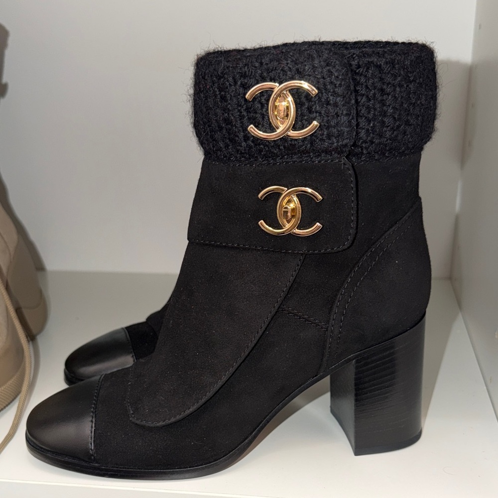 CHANEL Black Heeled Boots with Gold Logo